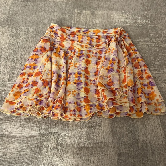 Aerie Wrap Tie Dye Mini Skirt — Cream Skirt with Orange/Purple Tie Dye Pattern - Picture 3 of 7